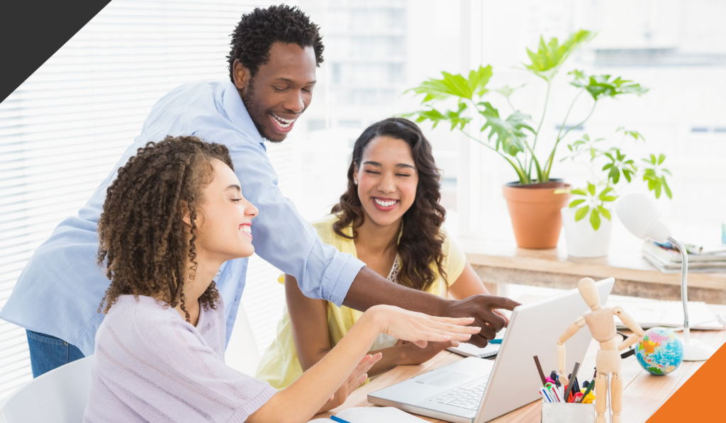 3 employees demonstrating agile leadership principles while working on a product schedule